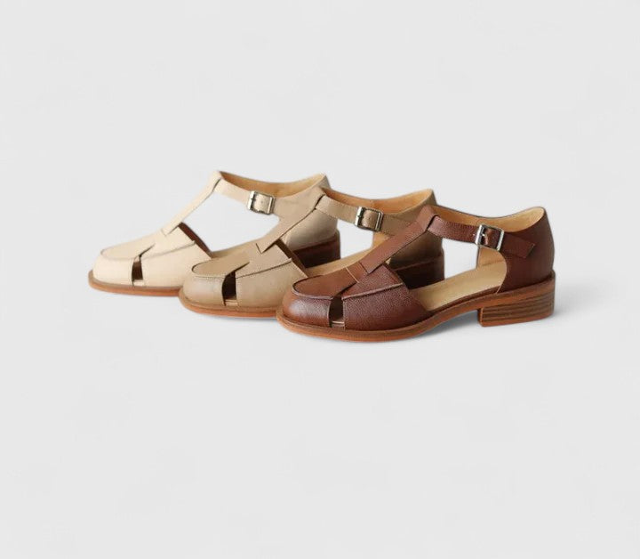 Isara | Low block heel sandals with side cut-out detail